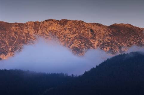 Mist in front of the Piatra Craiului massif, Piatra Craiului National Park, Transylvania, Southern Carpathian Mountains, Romania, October 2008  1230468 WildxWondersxofxEuropexDörr