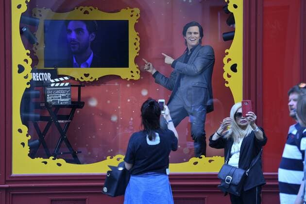 Visitors take pictures of the wax figure of US actor Jim Carrey during the opening of the Museum Madame Tussauds Prague in Prague, Czech Republic, July 11, 2019. It is the first branch of the famous London Museum in Central and Eastern Europe, with a total of 24 worldwide. (CTKxPhoto MichalxKamaryt) CTKPhotoP201907110824101  kmt 4