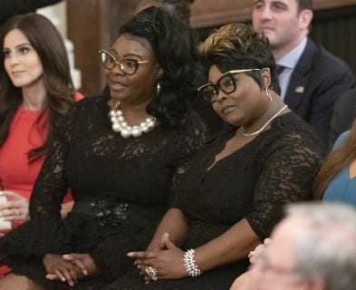 Diamond and Silk listen as United States President Donald J. Trump delivers remarks at the Presidential Social Media Summit in the East Room of the White House in Washington, DC on Thursday, July 11, 2019. Copyright: x©2019xRonxSachsxConsolidatedxNewsxPhotosxxxAllxRightsxReservedx