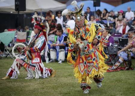 (190715) -- VANCOUVER, July 15, 2019 (Xinhua) -- Dancers perform during the 32nd annual Squamish Nation Youth Pow Wow at Capilano Reserve Park in west Vancouver, Canada, July 14, 2019. First Nations people from Canada and the U.S. took part in the 32nd annual Squamish Nation Youth Pow Wow in celebration of indigenous cultures. Pow Wow is an indigenous cultural activity in which people socialize together via different activities like dancing, singing, and honouring the traditions of their ancestors. (Xinhua Liang Sen) CANADA-VANCOUVER-SQUAMISH NATION YOUTH POW WOW 