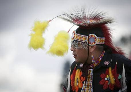 (190715) -- VANCOUVER, July 15, 2019 (Xinhua) -- A man dressed in regalia is seen during the 32nd annual Squamish Nation Youth Pow Wow at Capilano Reserve Park in west Vancouver, Canada, July 14, 2019. First Nations people from Canada and the U.S. took part in the 32nd annual Squamish Nation Youth Pow Wow in celebration of indigenous cultures. Pow Wow is an indigenous cultural activity in which people socialize together via different activities like dancing, singing, and honouring the traditions of their ancestors. (Xinhua Liang Sen) CANADA-VANCOUVER-SQUAMISH NATION YOUTH POW WOW 
