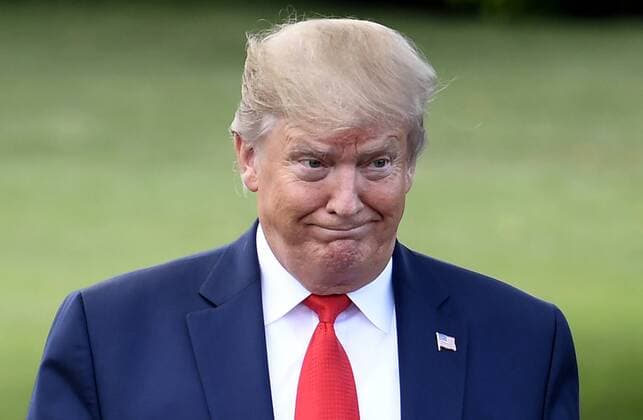 President Donald Trump gestures as he walks to make remarks to the press as he departs the White House, Wednesday, July 24, 2019, Washington, DC. Trump, who is heading to a rally in West Virginia, commented on Special Counsel Robert Mueller s testimony before Congress earlier in the day.  WAP20190724509 MIKExTHEILER