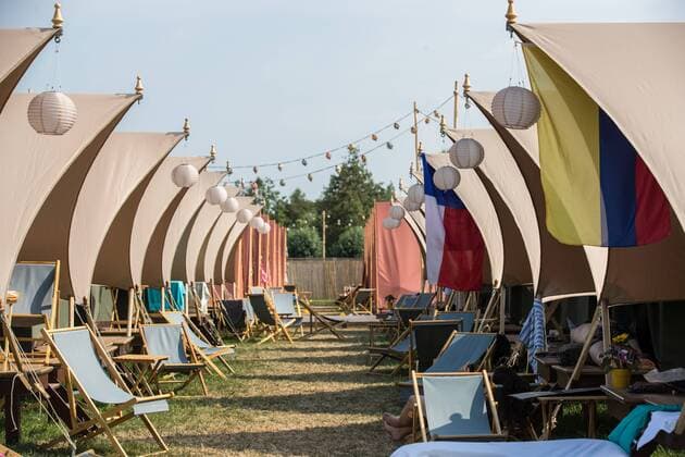 Glamping tents at Dreamville camping pictured during the first day of the second weekend of the Tomorrowland music festival, Friday 26 July 2019. The 15th edition of Tomorrowland electronic music festival takes place at the De Schorre terrain in Boom from 19 to 21 July 2019 and from 26 to 28 July 2019.  DAVIDxPINTENS 05633916