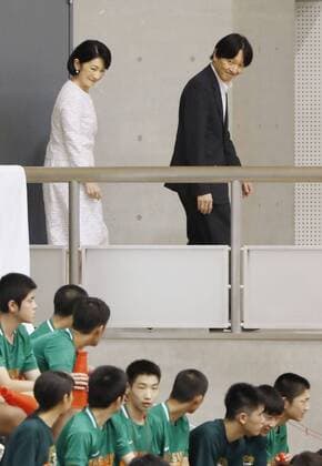 CORRECTED: Japanese crown prince in Kagoshima Japanese Crown Prince Fumihito (R) and Crown Princess Kiko enter the venue for the national inter-high school basketball championships in Satsumasendai, Kagoshima Prefecture, southwestern Japan, on July 28, 2019. 
