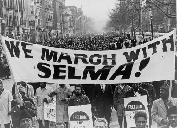 Marchers carrying banner lead the way as 15 Marchers carrying banner lead the way as 15,000 parade. Photograph shows marchers carrying banner We march with Selma! on street in Harlem, New York City, New York. 1965 March. World Telegram & Sun photograph by Stanley Wolfson. Copyright: xPhoto12 AnnxRonanxPicturexLibraryx ARP15A01146