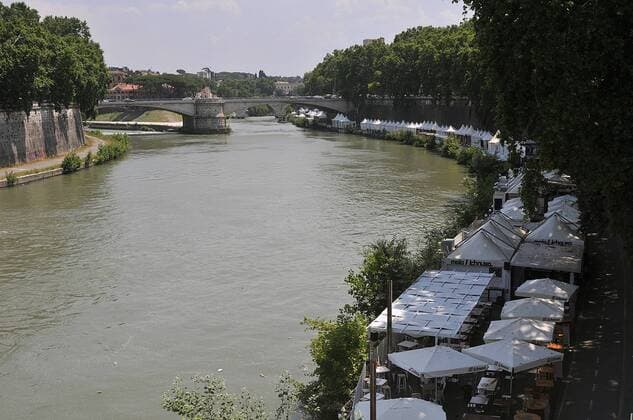 Rome Italy _ 19July 2019 Tevere river in italy and othr word Tiber river is third largest river in Italy and Tevere rive is dying not fresh water brige and st.peters vatical view fro Tevere river in Rome Italy. (Photo..Francis Dean Deanpictures. 