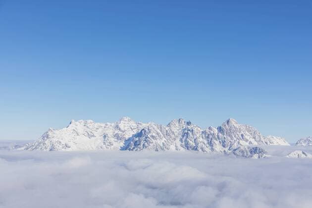 View over snowy mountains at sunshine, Saalbach Hinterglemm, Pinzgau, Austria  MMAF01063