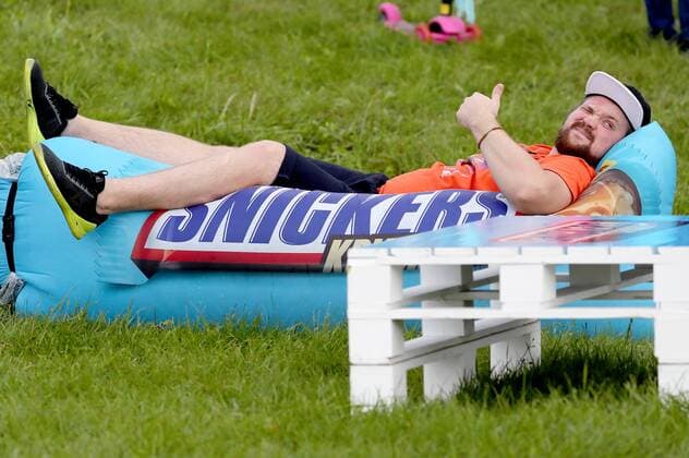 MOSCOW, RUSSIA - AUGUST 3, 2019: A man attends the 2019 Afisha Picnic music festival at Moscow s Kolomenskoye Museum-Reserve. Anton Novoderezhkin TASS  TS0B5530