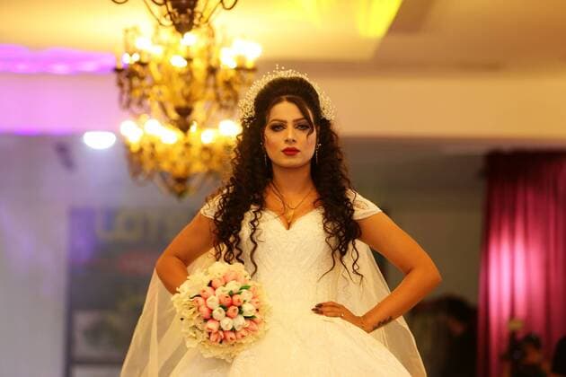 (190803) -- BAGHDAD, Aug. 3, 2019 (Xinhua) -- A model presents a creation by Iraqi designers Ahmed al-Budairi and Inas al-Tamimi during a fashion show in Baghdad, Iraq, on Aug. 3, 2019. (Xinhua Khalil Dawood) IRAQ-BAGHDAD-FASHION SHOW 
