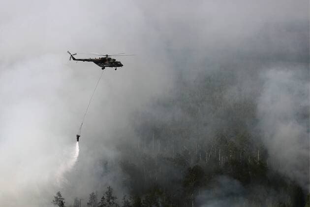 News Themen der Woche KW31 News Bilder des Tages Russland, WaldbrÃ¤nde in der Region Krasnojarsk KRASNOYARSK TERRITORY, RUSSIA - AUGUST 4, 2019: Battling a forest fire in Boguchany District; over 1 million hectares of woodland have been hit by wildfires in Russia s Krasnoyarsk Territory. Donat Sorokin TASS  TS0B56E0