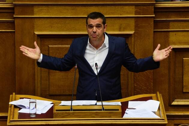Greece: Legislation for Greek State President of Syriza and opposition leader of Hellenic parliament Alexis Tsipras, during his speech in the parliament. Athens Attiki Greece Hellenic Parliament  DimitriosxKarvountzis