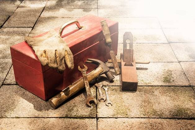  Construction tools with red tools box on brick ground.  Copyright: xkirisa99x Panthermedia25847874