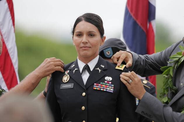 October 12, 2015, Honolulu, Hawaii, USA: Congresswoman TULSI GABBARD (HI-02) was promoted in rank by the Hawaii Army National Guard from Captain to Major in a ceremony at the National Memorial Cemetery of the Pacific (Punchbowl). Former U.S. Senator Daniel K. Akaka led Tulsi in reciting her Oath of Office. Honolulu USA - ZUMAz03_ 20151012_new_z03_061 Copyright: xHouse.orgx