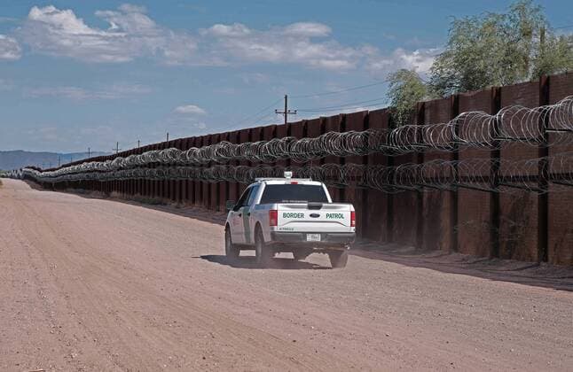 August 19, 2019, Lukeville, Arizona, US: US Border Patrol along the border fence in Lukeville, Arizona. This two mile portion of the fence will be torn down starting this week and replaced by 30 foot tall steel Bollard wall. 38.6 miles of the existing vehicle barriers that runs along the border with Mexico in the Cabeza Prieta National Wildlife Refugee and Organ Pipe Cactus Monument will be replaced by a wall but the work has been postponed until October. Various environmental groups have sued to halt construction and matter is back before a Federal judge. The Supreme Court has allowed the Trump administration to use funds obtained through the budget of the DOD to replace existing fencing with a 30 foot wall in this sector Lukeville US - ZUMAb411 20190819_zap_b411_009 Copyright: xChristopherxBrownx