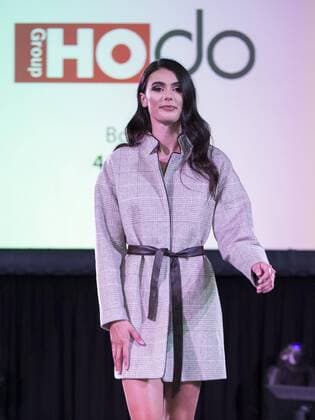 (190820) -- TORONTO, Aug. 20, 2019 -- A model presents a creation during the fashion show of the 2019 Apparel Textile Sourcing Canada trade show in Toronto, Canada, on Aug. 20, 2019. The fashion show displayed the latest designs from dozens of fashion brands around the world on Tuesday. (Photo by Xinhua) CANADA-TORONTO-APPAREL TEXTILE SOURCING TRADE SHOW-FASHION ZouxZheng 