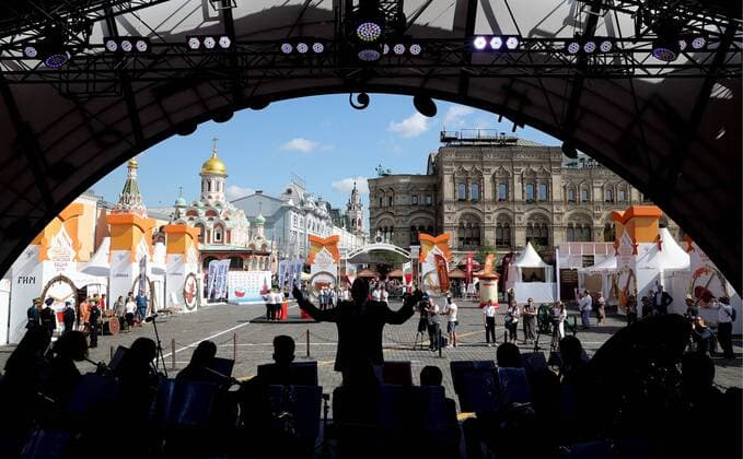 MOSCOW, RUSSIA - AUGUST 23, 2019: Participants in the Spasskaya Tower Festival of Children s Wind Bands perform at the Children Playground in Red Square as part of the 12th Spasskaya Tower International Military Music Festival. Mikhail Tereshchenko TASS  TS0B77E4