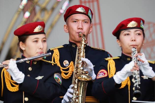 MOSCOW, RUSSIA - AUGUST 23, 2019: Participants in the Spasskaya Tower Festival of Children s Wind Bands perform at the Children Playground in Red Square as part of the 12th Spasskaya Tower International Military Music Festival. Mikhail Tereshchenko TASS  TS0B77E7