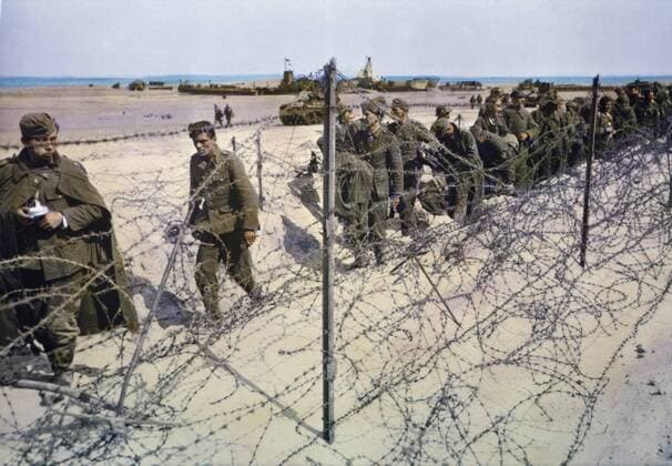 Captured German Soldiers Kept in Barbed Wire Enclosure on Beach during Invasion of Normandy, France, June 1944  Copyright: xJTxVintagex jtv011708