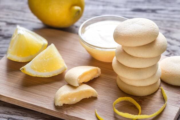  Biscuits filled with lemon cream on the wooden board  Copyright: xAlex9500x Panthermedia26891941