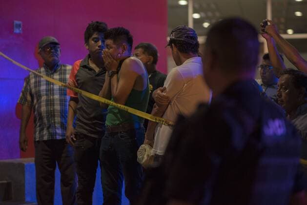 (190828) -- COATZACOALCOS, Aug. 28, 2019 (Xinhua) -- People gather near a nightclub waiting for information in Coatzacoalcos, Mexico, Aug. 27, 2019. A total of 23 people were killed and some 10 others seriously injured when a nightclub in eastern Mexico was set on fire Tuesday night, local authorities said. (Photo by Angel Hernandez Xinhua) (SPOT NEWS)MEXICO-COATZACOALCOS-NIGHTCLUB-FIRE 