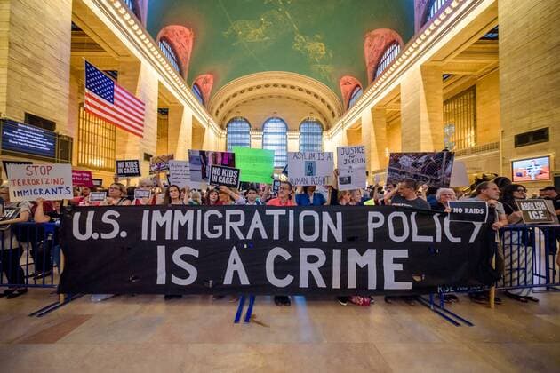 August 29, 2019, New York, USA: Members of the activist group Resist gathered a silent protest inside the main hall at Grand Central Station holding NO RAIDS CLOSE THE CAMPS ABOLISH ICE banners, photographs of the children who have died in ICE custody, and photographs of the detention camps to object to Border Patrol and ICE treatment of immigrants, refugees, and asylum seekers. USA - ZUMAm432 20190829_znp_m432_016 Copyright: xErikxMcGregorx