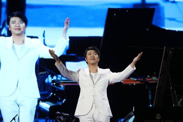 Chinese pianist Lang Lang appears at the Concert of Lang Lang and His Friends 2019, in Rizhao city, east China s Shandong province, 1 September 2019. Chinese pianist Lang Lang performs during the Concert of Lang Lang and His Friends 2019, at which his newly-married wife Gina Alice shows up and the couple conduct piano four hands together, in Rizhao city, east China s Shandong province, 1 September 2019.