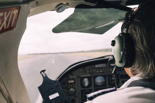 Pilot and dashboard of a small plane on the runway ready to take off  GEMF02995