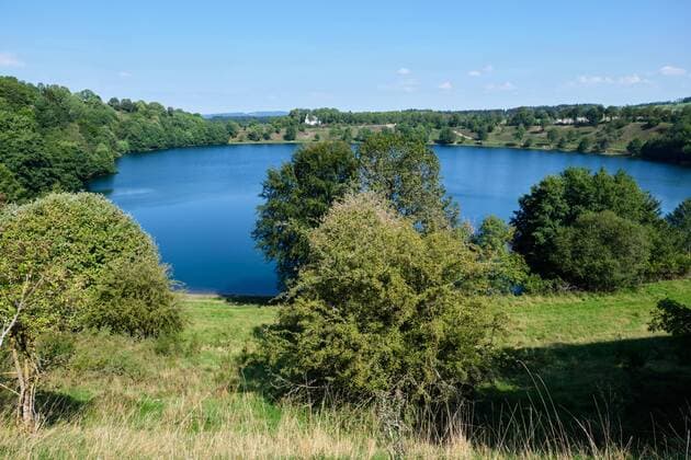 Landscape with maar in volcanic eifel in Germany Image of lakes and maar in the famous area volcanic eifel in Germany in summer Daun Rhineland Pfalz Germany