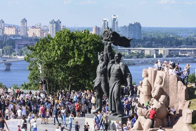 People s Friendship Arch (Friendship of Nations Monument), bronze statue depicting a Russian and Ukrainian workers holding up the Soviet Order of Friendship of Peoples, granite stele depicting the participants of the Pereyaslav Council of 1654 Kiev, Kyiv Kyiv Ukraine