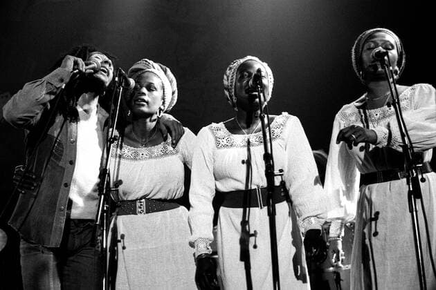 Bob Marley and the I Three, 1977 Jamaican musician Bob Marley in concert in Munich in 1977. He sings with the Wailers vocal trio, the I Three (Marcia Griffiths, Judy Mowatt and Rita Marley). Copyright: xIlsexRuppert Photo12x RPP18A00_048