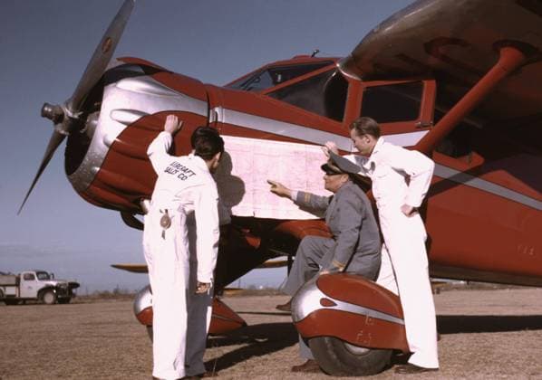 Instructor and Students Studying Map, Meacham Field, Fort Worth, Texas, USA, Arthur Rothstein for Farm Security Administration (FSA), January 1942 Editorial Use Only  Copyright: CircaxImages ghi-circa01698