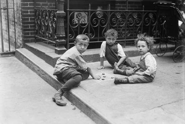 Three Young Boys Playing Game on Sidewalk, New York City, New York, USA, Bain News Service, July 1913  Copyright: CircaxImages ghi-circa02818