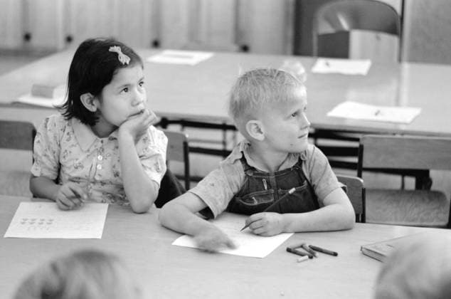 Two Children of Migratory Workers in Elementary School Classroom at FSA Camp, Weslaco, Texas, USA, Arthur Rothstein for Farm Security Administration, February 1942 Editorial Use Only  Copyright: CircaxImages ghi-circa04734