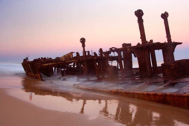 Maheno ship wreck - wreck of the famous Maheno stranded on the eastern beach of Fraser Island, at dusk. 75-Mile Beach, Fraser Island World Heritage Area, Great Sandy National Park, Queensland, Australia .  Copyright: Steffenx&xAlexandraxSailer 10758428