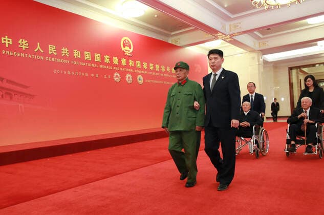 (190929) -- BEIJING, Sept. 29, 2019 -- Awardees of the Medal of the Republic Li Yannian, Zhang Fuqing and Huang Xuhua prepare to enter the Golden Hall at the Great Hall of the People in Beijing, capital of China, Sept. 29, 2019. China held the presentation ceremony of the national medals and honorary titles on Sunday at the Great Hall of the People, ahead of the 70th anniversary of the founding of the People s Republic of China (PRC) on Oct. 1. ) CHINA-BEIJING-NATIONAL MEDALS-HONORARY TITLES-PRC FOUNDING-70TH ANNIVERSARY (CN) PangxXinglei 