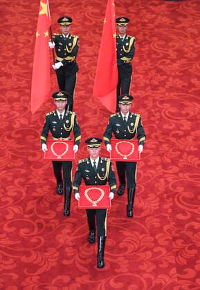 (190929) -- BEIJING, Sept. 29, 2019 -- Guards of honor escort the Medal of the Republic, the Friendship Medal and the Medal for recipients of national honorary titles during the presentation ceremony at the Great Hall of the People in Beijing, capital of China, Sept. 29, 2019. China held the presentation ceremony of the national medals and honorary titles on Sunday at the Great Hall of the People, ahead of the 70th anniversary of the founding of the People s Republic of China (PRC) on Oct. 1. ) CHINA-BEIJING-NATIONAL MEDALS-HONORARY TITLES-PRC FOUNDING-70TH ANNIVERSARY (CN) YinxBogu 