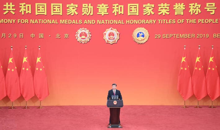 (190929) -- BEIJING, Sept. 29, 2019 -- Chinese President Xi Jinping, also general secretary of the Communist Party of China Central Committee and chairman of the Central Military Commission, delivers a speech at the presentation ceremony of the national medals and honorary titles of the People s Republic of China at the Great Hall of the People in Beijing, capital of China, Sept. 29, 2019. Xi presented the medals to the awardees before the speech. ) CHINA-BEIJING-NATIONAL MEDALS AND HONORARY TITLES-PRESENTATION CEREMONY (CN) YinxBogu 