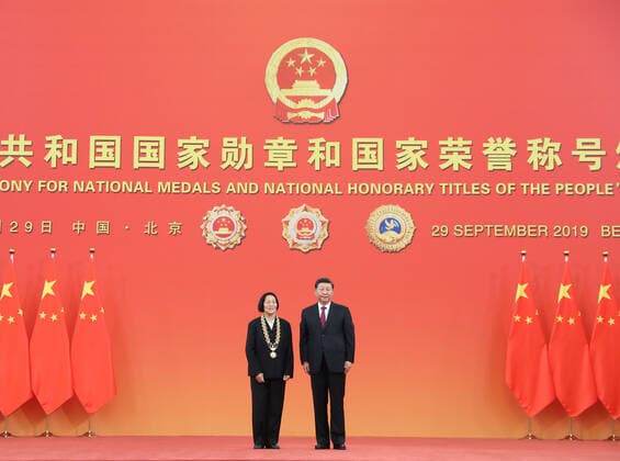 (190929) -- BEIJING, Sept. 29, 2019 -- Chinese President Xi Jinping, also general secretary of the Communist Party of China Central Committee and chairman of the Central Military Commission, presents the Medal of the Republic to Shen Jilan at the presentation ceremony of the national medals and honorary titles of the People s Republic of China at the Great Hall of the People in Beijing, capital of China, Sept. 29, 2019. ) CHINA-BEIJING-NATIONAL MEDALS AND HONORARY TITLES-PRESENTATION CEREMONY (CN) WangxYe 
