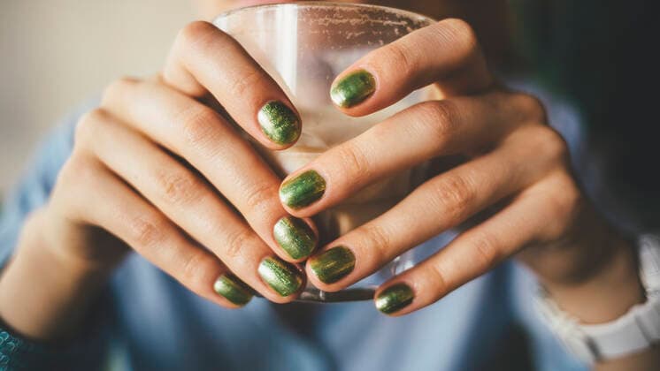Close-up of female hands holding a glass of coffee model released Symbolfoto  OYF00062