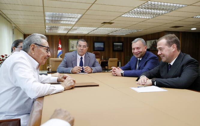 HAVANA, CUBA â€“ OCTOBER 3, 2019: Cuban Communist Party Leader Raul Castro (L), Russia s Prime Minister Dmitry Medvedev, and his deputy Yuri Borisov (R-L) during a meeting. Dmitry Astakhov POOL TASS  TS0BD8CD