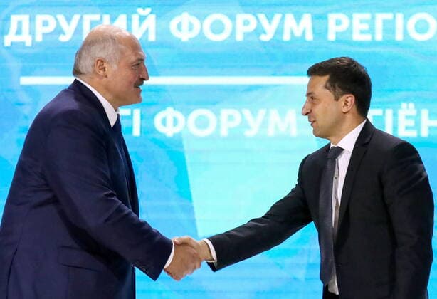 ZHYTOMYR, UKRAINE - OCTOBER 4, 2019: Belarusian President Alexander Lukashenko (L) and Ukraine s President Volodymyr (Vladimir) Zelensky shake hands at the 2nd Forum of Regions of Ukraine and Belarus; the annual forum is aimed at boosting bilateral relations, cooperation between Ukrainian and Belarusian businesses, and joint efforts to manage environmental issues. Pyotr Sivkov TASS  TS0BDA5D