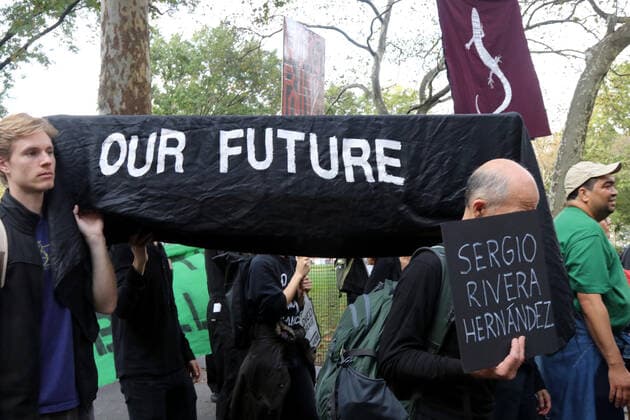 October 7, 2019, New York City, New York, US: Climate action group Extinction Rebellion launched a series of climate change protests around the globe on 7 October 2019, that featured large numbers of New York climate activists descending on lower Manhattan in actions that saw the iconic Charging Bull statute showered In Fake Blood and a die-in at the New York Stock Exchange on Wall Street, resulted in many arrests. New York City US - ZUMAl135 20191007_zap_l135_017 Copyright: xG.xRonaldxLopezx