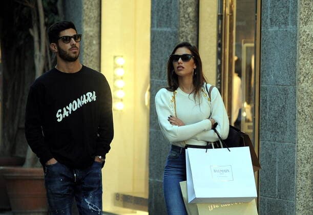Milan, Marco Asensio and girlfriend Sandra Garal in the center Marco Asensio footballer of REAL MADRID and of the national SPAIN, caught walking around the downtown streets. Here he goes shopping in the streets of the fashion district with his girlfriend SANDRA GARAL. First by Gio Moretti, then by Dolce & Gabbana, then they notice the presence of the photographers and decide to return to the hotel.  Copyright: xMimmoxCarrierox xIPAx xMimmoxCarrierox