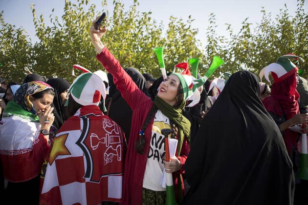 October 10, 2019, Tehran, Iran: Iranian women cheer as they arrive at the Azadi Stadium to watch the 2022 World Cup qualifier soccer match between Iran and Cambodia, in Tehran, Iran. Iranian women were freely allowed into the stadium for the first time in decades. They had been banned since 1981. Tehran Iran - ZUMAf146 20191010_zip_f146_012 Copyright: xRouzbehxFouladix