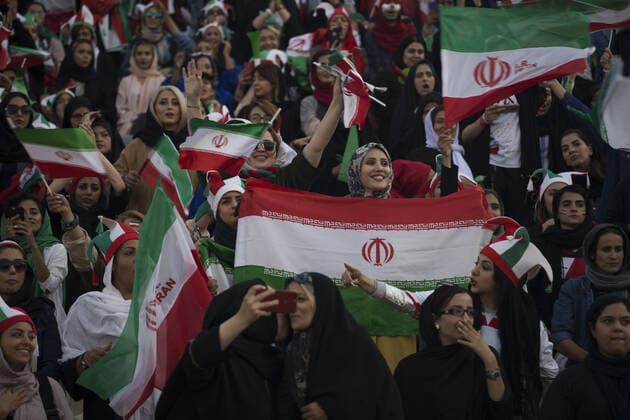 October 10, 2019, Tehran, Iran: Iranian women cheer during a soccer match between their national team and Cambodia in the 2022 World Cup qualifier at the Azadi (Freedom) Stadium in Tehran, Iran. Iranian women were freely allowed into the stadium for the first time in decades. The decision follows the death of a young woman who set herself on fire after hearing she could face prison time for sneaking into an Iranian soccer match disguised as a man. Tehran Iran - ZUMAf146 20191010_zip_f146_027 Copyright: xRouzbehxFouladix