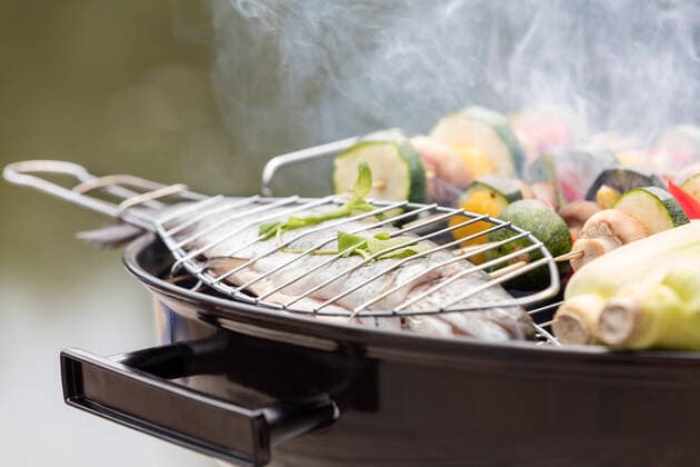 Close-up of food on barbecue grill at park,model released, Symbolfoto INH_19064_11896