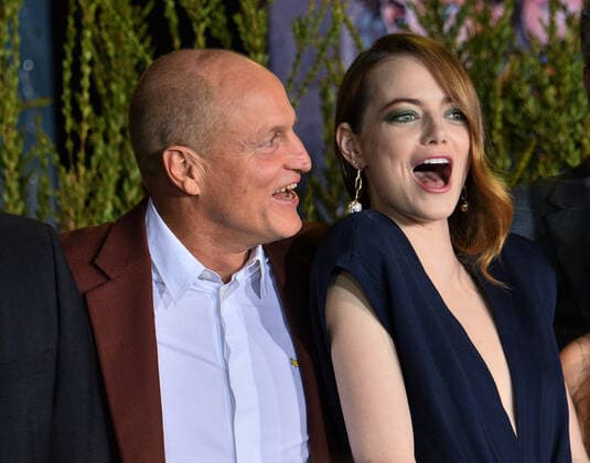 Cast members Woody Harrelson (L) and Emma Stone gather for a photo-op during the premiere of the motion picture horror comedy Zombieland: Double Tap at the Regency Village Theatre in the Westwood section of Los Angeles on Thursday, October 10, 2019. Storyline: Columbus, Tallahassee, Wichita, and Little Rock move to the American heartland as they face off against evolved zombies, fellow survivors, and the growing pains of the snarky makeshift family.  LAP2019101066 JIMxRUYMEN
