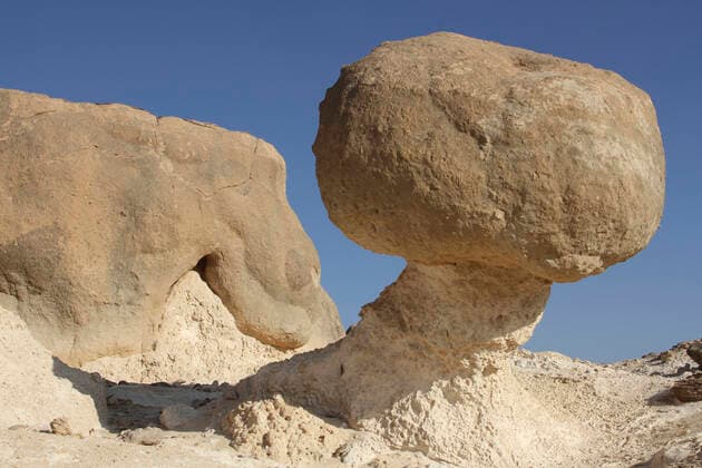 Rock Garden at Ad Duqm, with balancing rock, a popular tourist site, Oman, November 2012.  1545708 Hannex&xJensxEriksen
