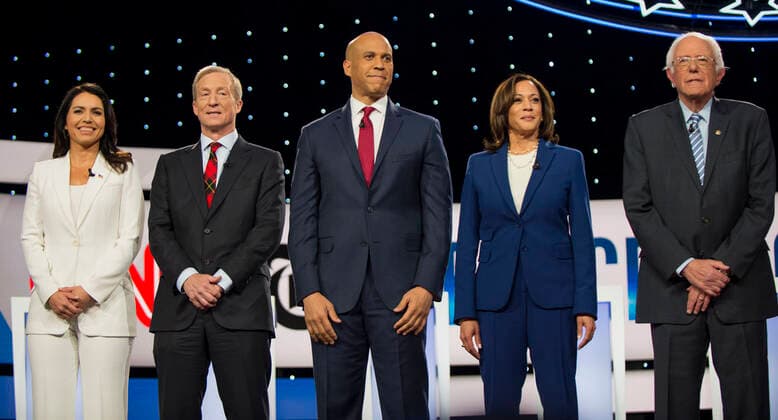 Sept.15, 2019 - Westerville, Ohio, U.S. - From left, TULSI GABBARD, TOM STEYER, CORY BOOKER, KAMALA HARRIS, BERNIE SANDERS pose for photographers prior to the Democratic Presidential Debate held at Otterbein University. Westerville U.S. - ZUMAce6_ 20191015_zaf_ce6_021 Copyright: xBrianxCahnx