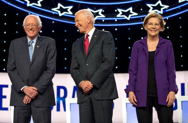 October 15, 2019, Westerville, Ohio, USA: From left, BERNIE SANDERS, JOE BIDEN and ELIZABETH WARREN pose for photographers prior to the Democratic Presidential Debate hosted by CNN and The New York Times and held at Otterbein University. Westerville U.S. - ZUMAce6_ 20191015_zaf_ce6_023 Copyright: xBrianxCahnx